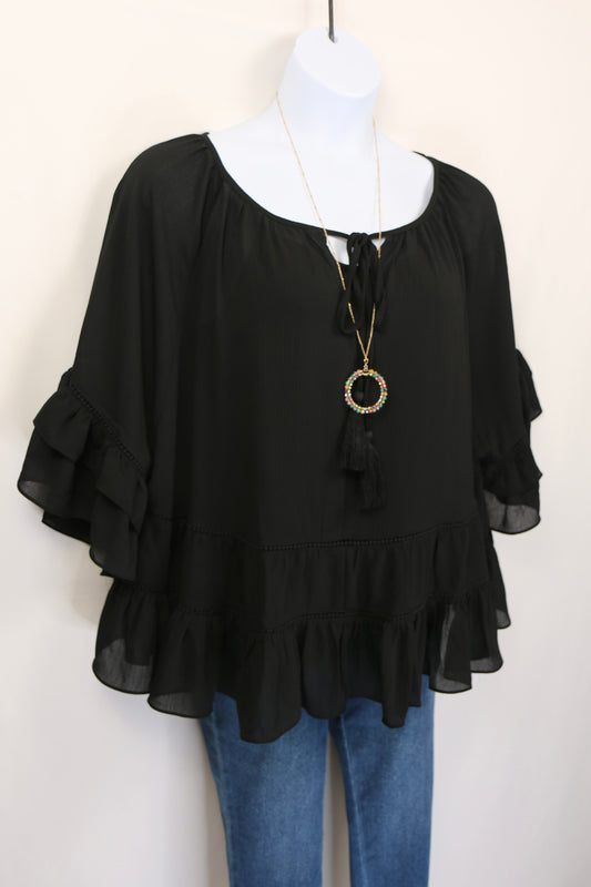 Black Tiered Ruffled Blouse with Tassels and Crochet details.
