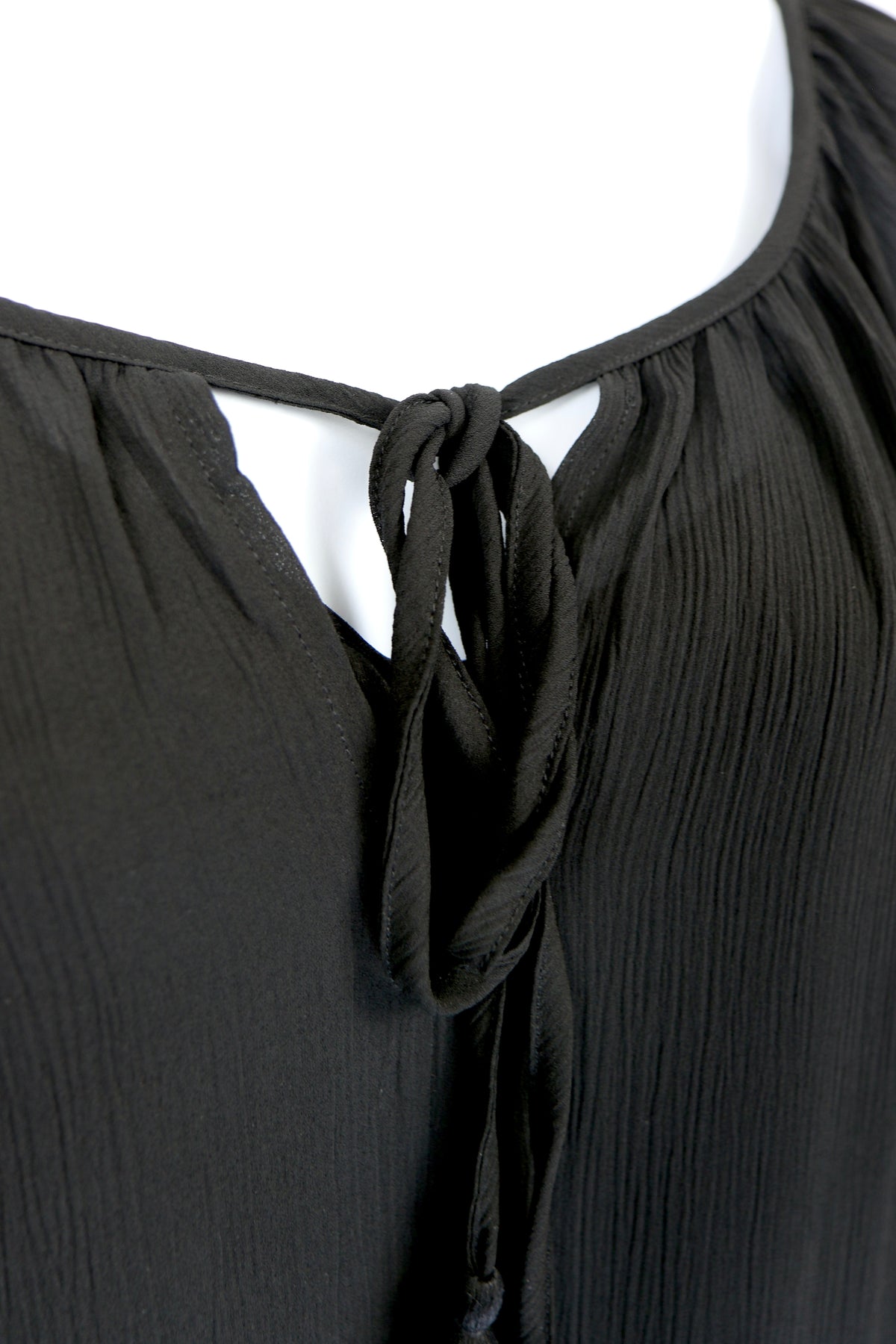 Black Tiered Ruffled Blouse with Tassels and Crochet details.