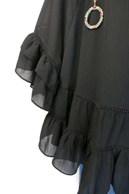 Black Tiered Ruffled Blouse with Tassels and Crochet details.