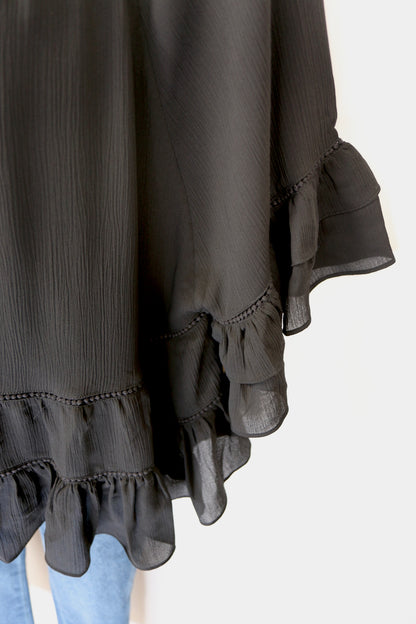 Black Tiered Ruffled Blouse with Tassels and Crochet details.