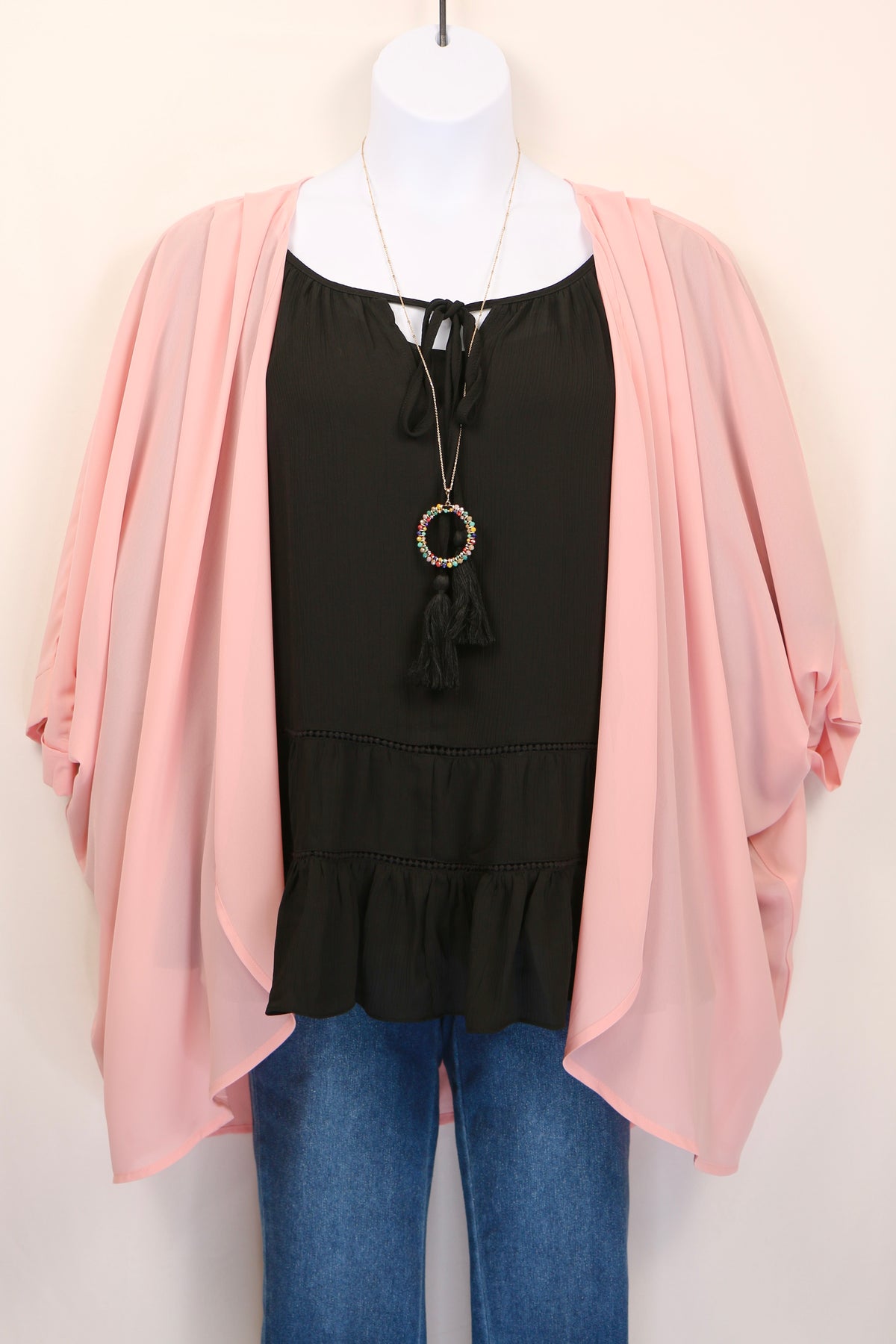Black Tiered Ruffled Blouse with Tassels and Crochet details.