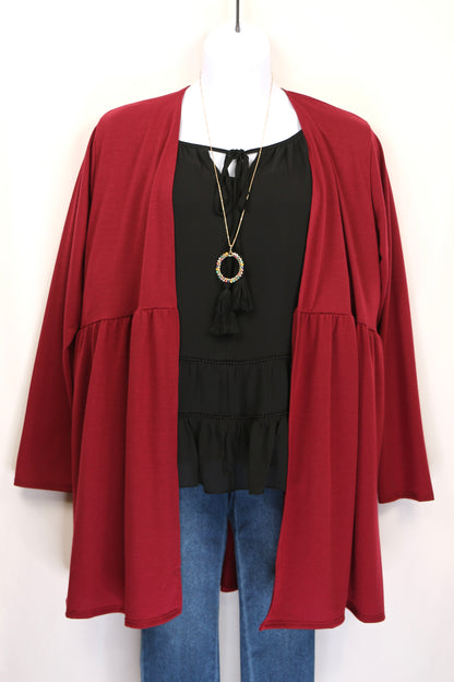 Black Tiered Ruffled Blouse with Tassels and Crochet details.